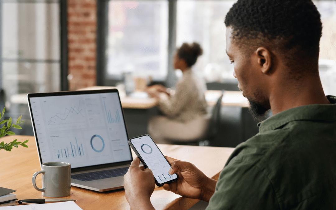 mobile conversion optimisation South Africa — entrepreneur reviewing mobile analytics on smartphone