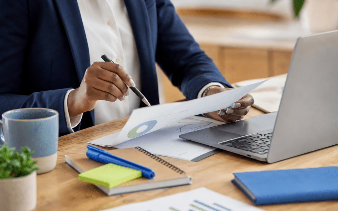 website project brief template south africa — professional reviewing website planning documents at desk