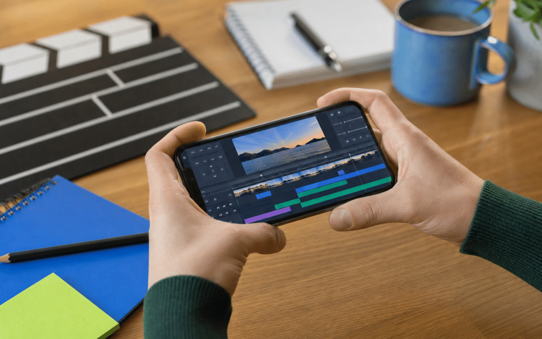 meta ads hook testing guide — smartphone with video timeline and clapperboard on wooden desk