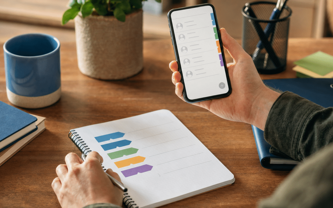 whatsapp business contact organisation guide - business owner reviewing labelled contact pipeline on smartphone