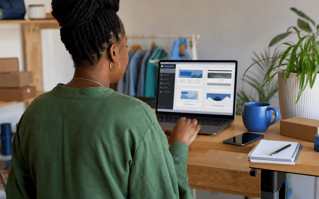 free website builders South Africa — person reviewing website builder options on laptop at a desk